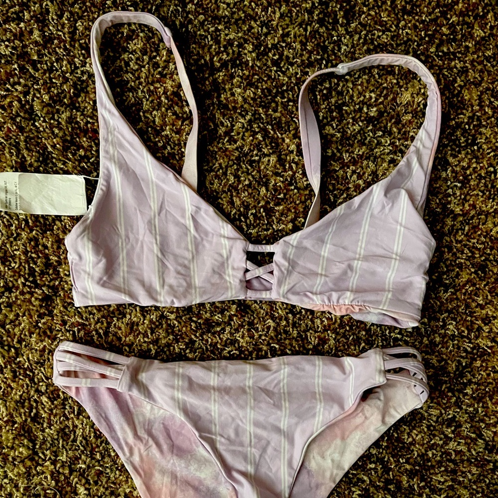 Roxy size medium reversible swim suit.